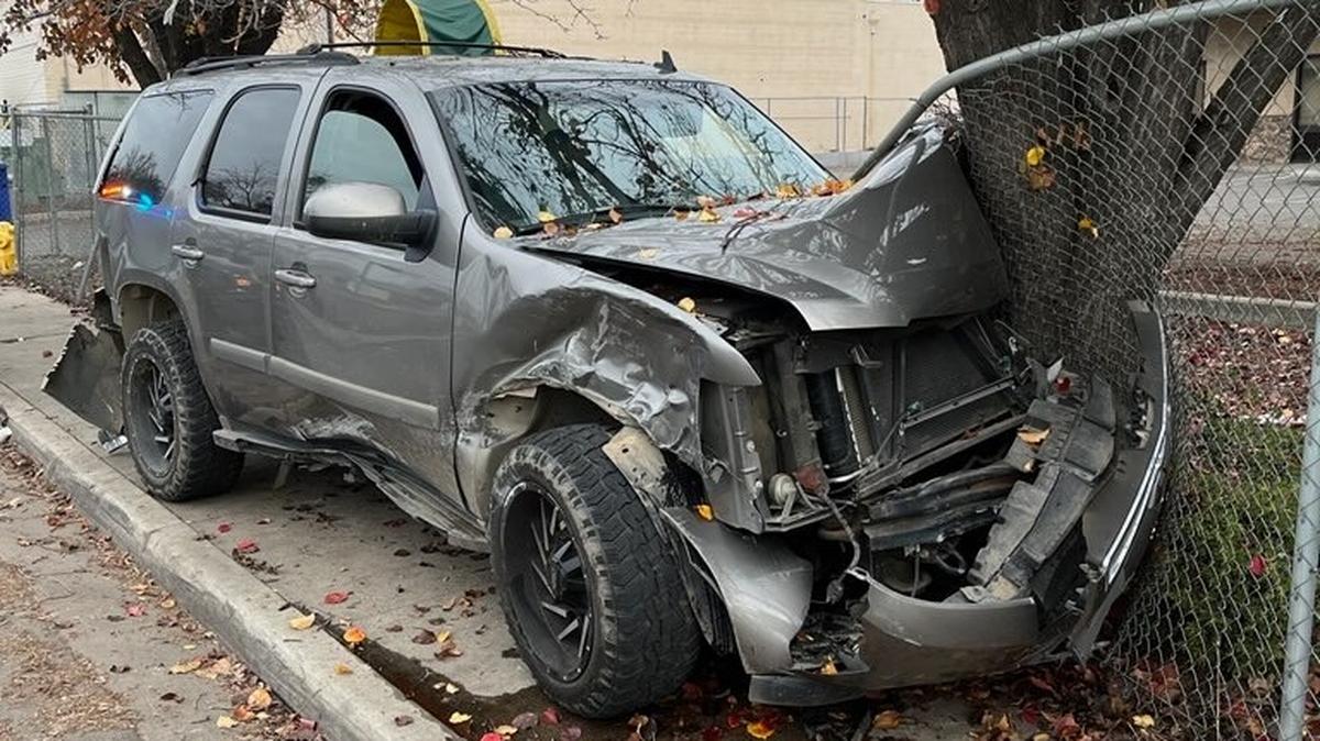 A vehicle reported to be stolen crashed into a fence following a pursuit through Modesto on Tuesday, Dec. 26, 2023.