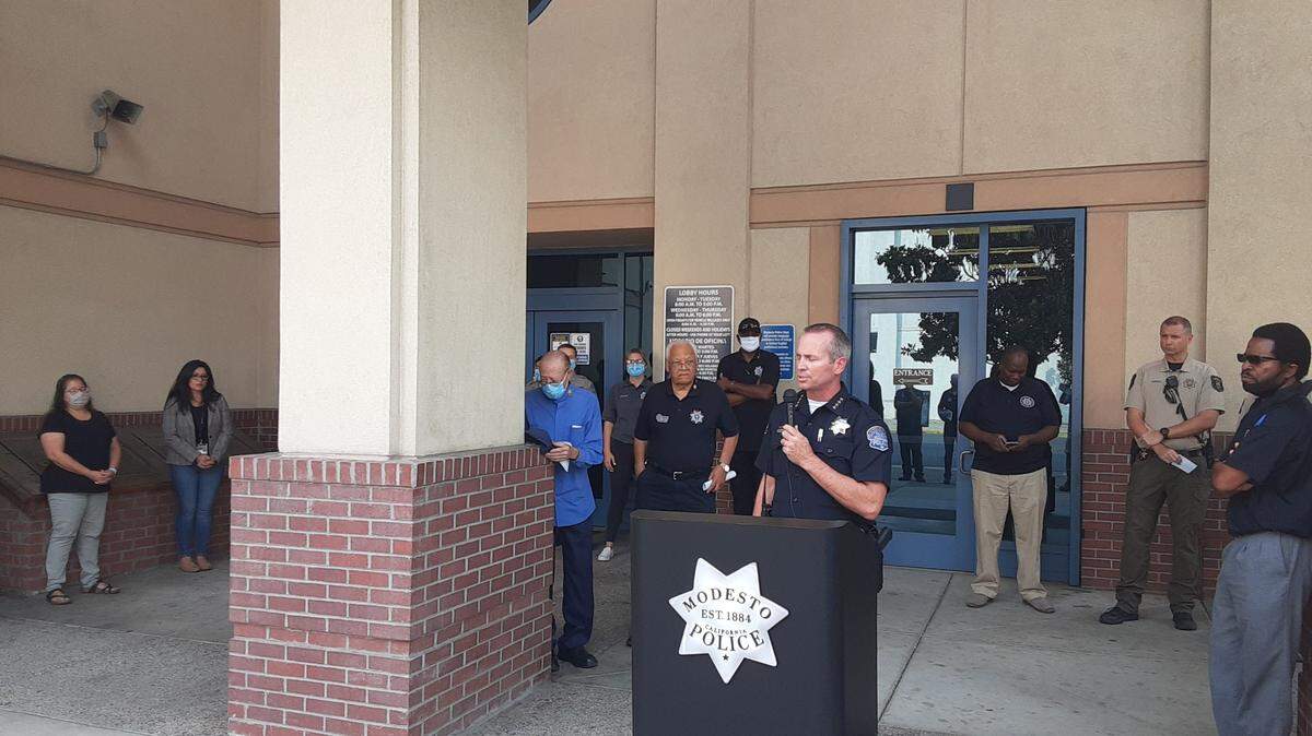 Nearly three dozen peace officers and others gathered Friday morning outside the Modesto Police Department to pray for officer Michael Rokaitis, who was shot and seriously wounded over the weekend while serving a search warrant. The Modesto Police Clergy Council put on the event.
