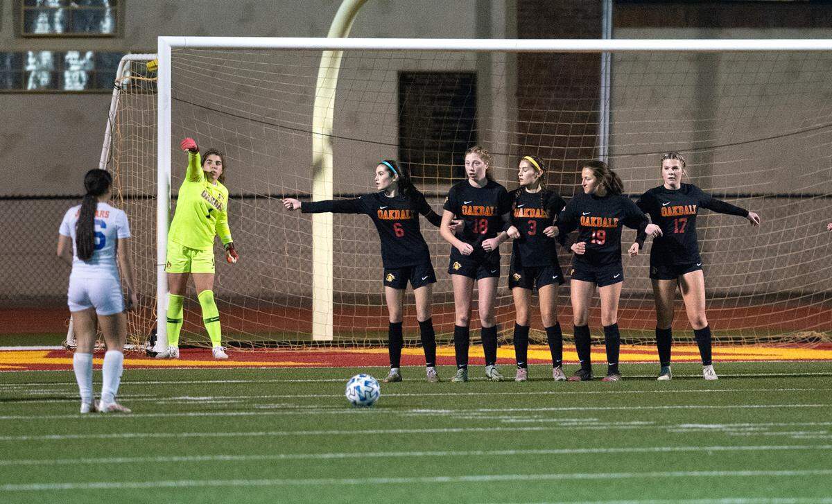 Oakdale players set up a defense against a Kimball free kick during the Valley Oak League game in Oakdale, Calif., Friday, Jan. 20, 2023.