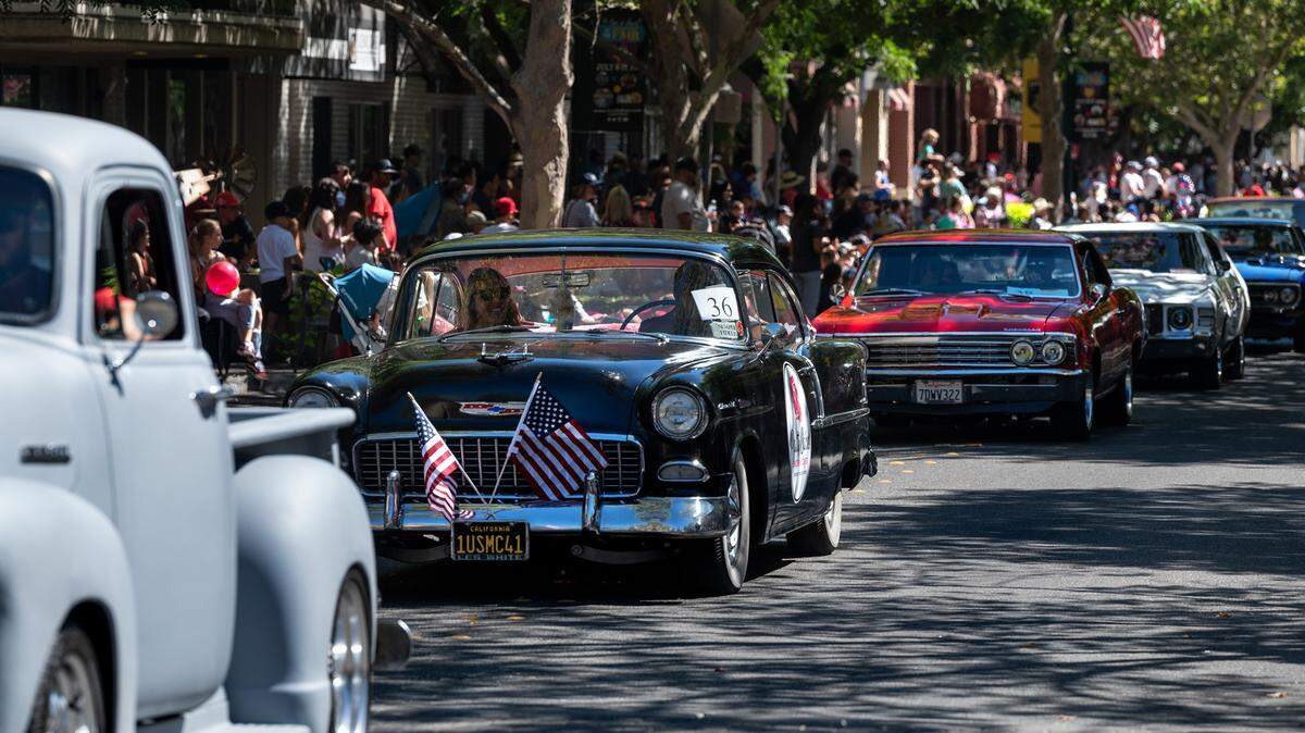 The annual downtown Fourth of July parade moves along Main Street in Turlock on Saturday, July 2, 2022.  