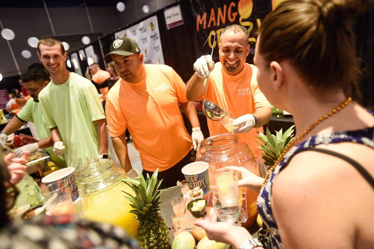Fruit drinks are served at the 2017 Edible Extravaganza at Modesto Centre Plaza.