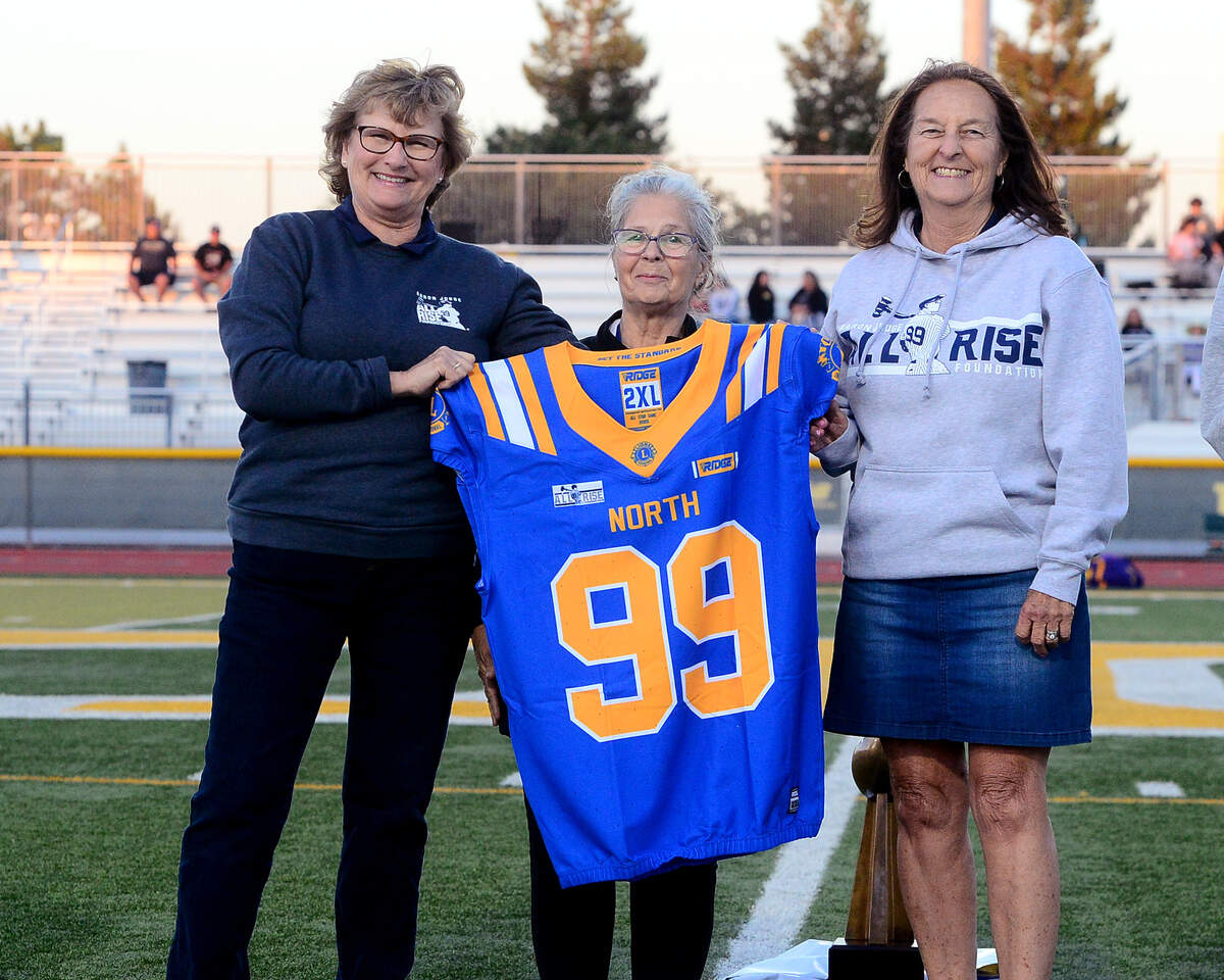 Patty Judge (left), mother of Aaron Judge, accepts a jersey from the Lions Club on behalf of the All Rise Foundation, Aaron Judge’s charitable organization, which donated jerseys for the Lions All-Star Game at the 50th Lions All-Star Game at Tracy High School in Tracy on June 20, 2026.
