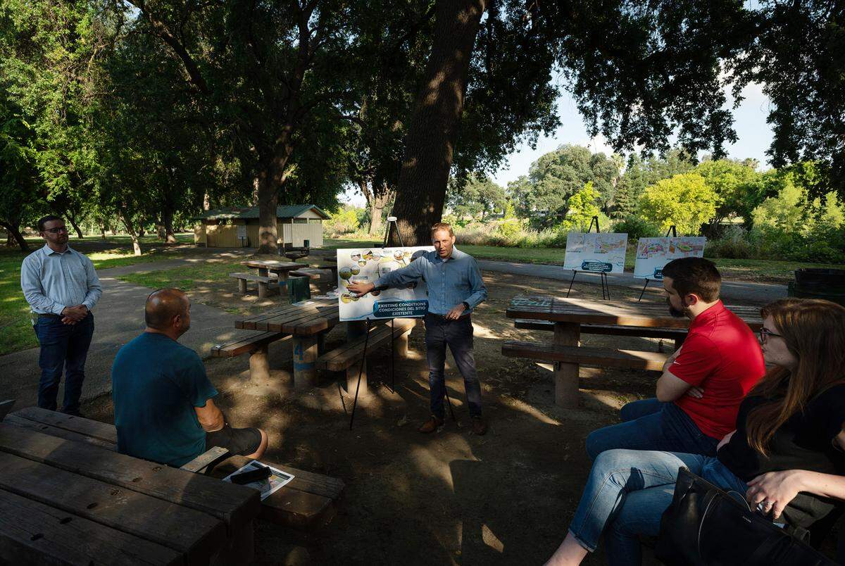 O’Dell Engineering’s Chad Kennedy describes the Tuolumne River Regional Park master plan update during a meeting in Mary Grogan Grove in Modesto, Calif., Thursday, June 7, 2023.