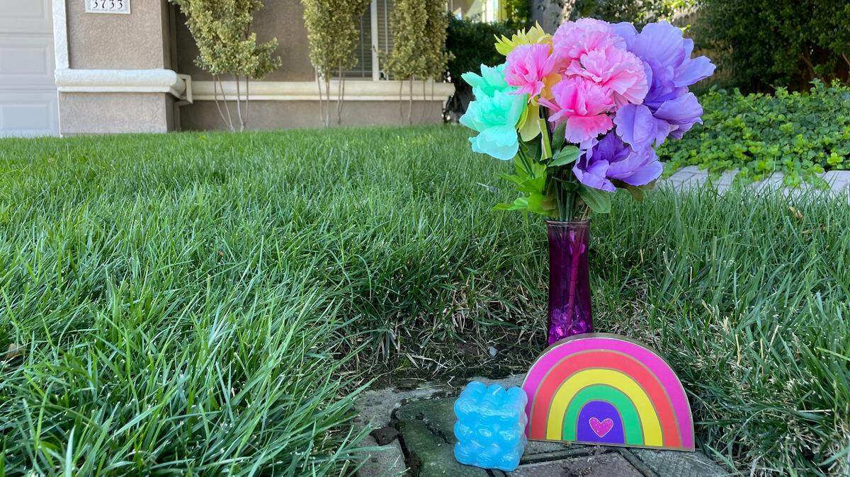 A memorial takes shape in the front yard of the Havenhurst Court home where a father is suspected of killing his daughter and then turning the gun on himself on July 12, 2023.