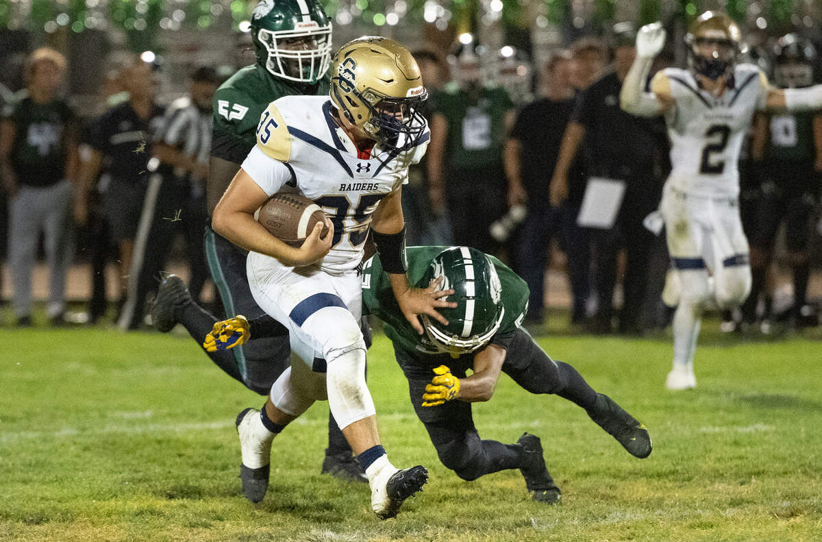 Central Catholic’s Wyatt Dragoo runs the ball during the Valley Oak League game with Manteca at Lathrop High School in Lathrop, Calif., Friday, Sept. 27, 2024.