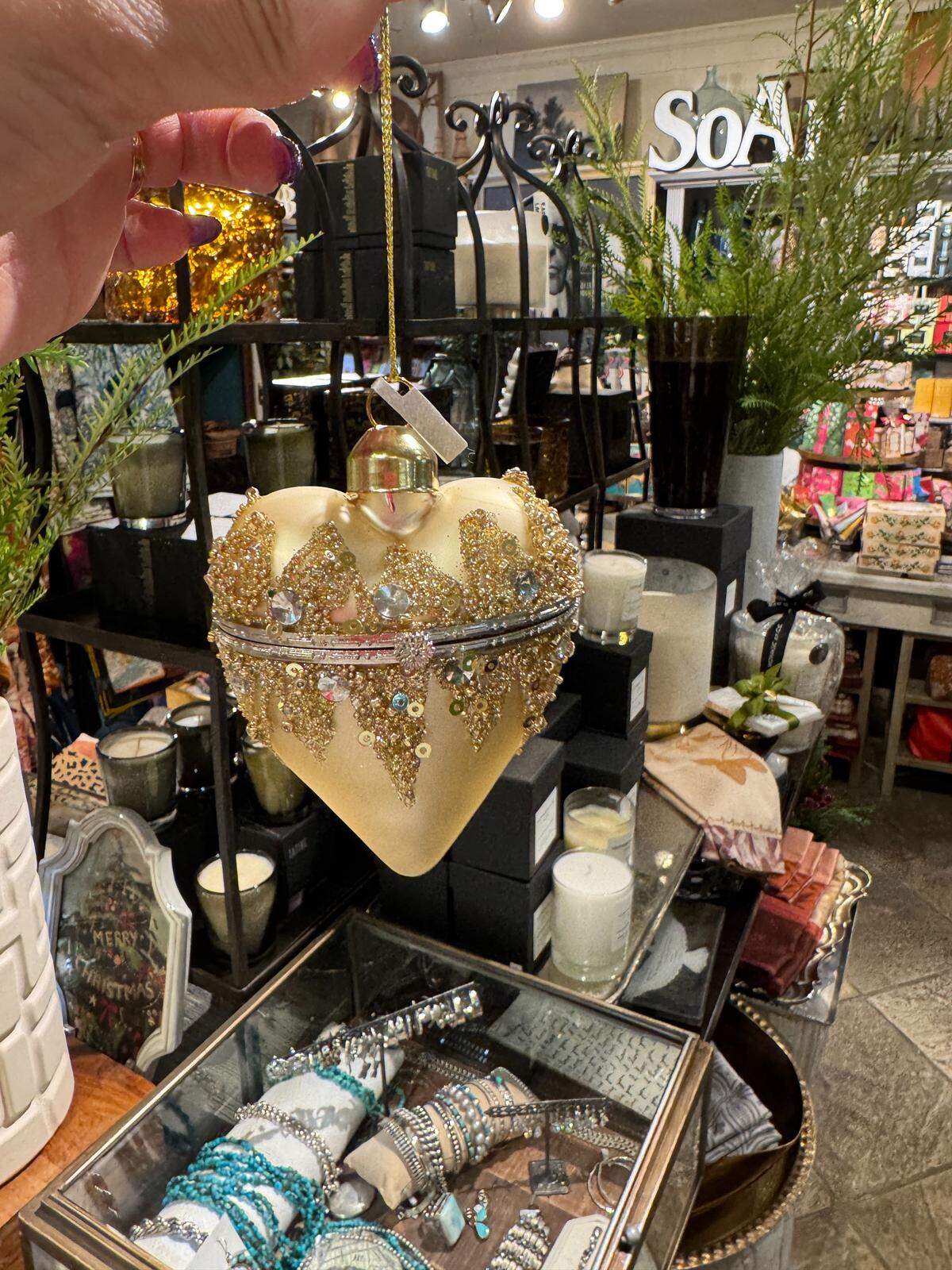 A keepsake Christmas ornament from Fleur De Lis store in Modesto.