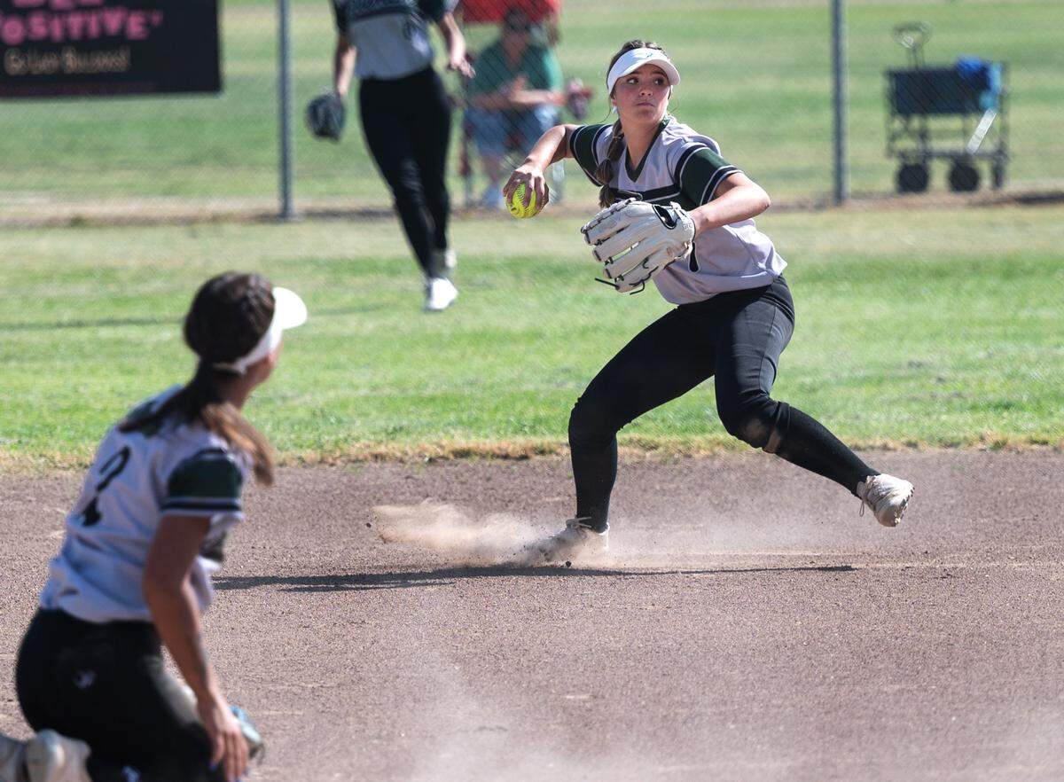 Turlock shortstop Julia Hernandez throws out a Pitman runner during the Central California Athletic League game at Turlock High School in Turlock, Calif., on Thursday, April 7, 2022. Turlock won the game 8-2.