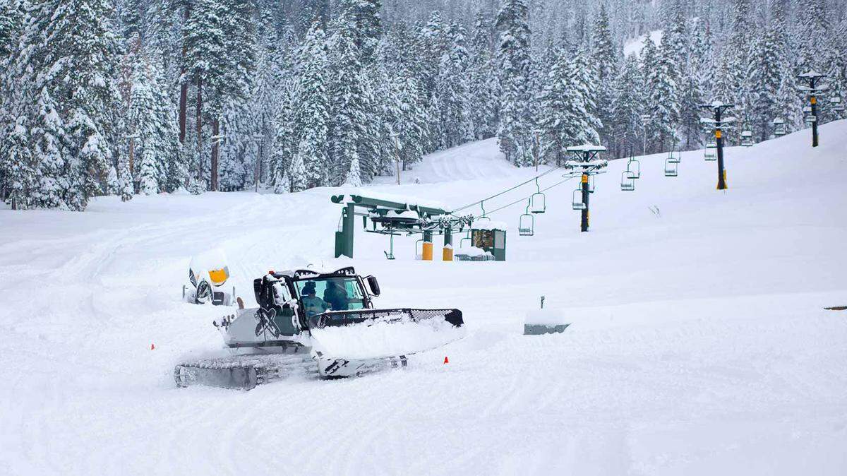 Heavy machinery prepares for the Nov. 11, 2022, opening of the Dodge Ridge ski area near Pinecrest CA.