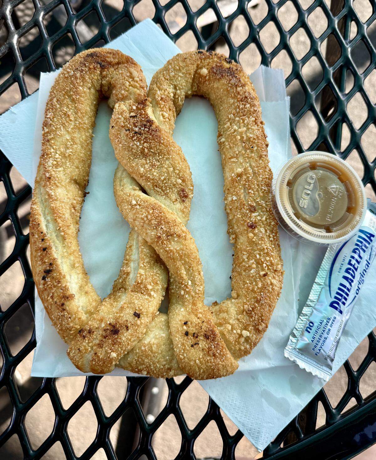 An almond pretzel with caramel and cream cheese from Twisties Pretzels in Modesto
