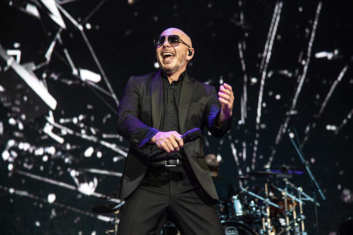Pitbull performs on stage at KAABOO Texas at AT&T Stadium on Sunday, May 12, 2019, in Arlington, Texas. (Photo by Amy Harris/Invision/AP)