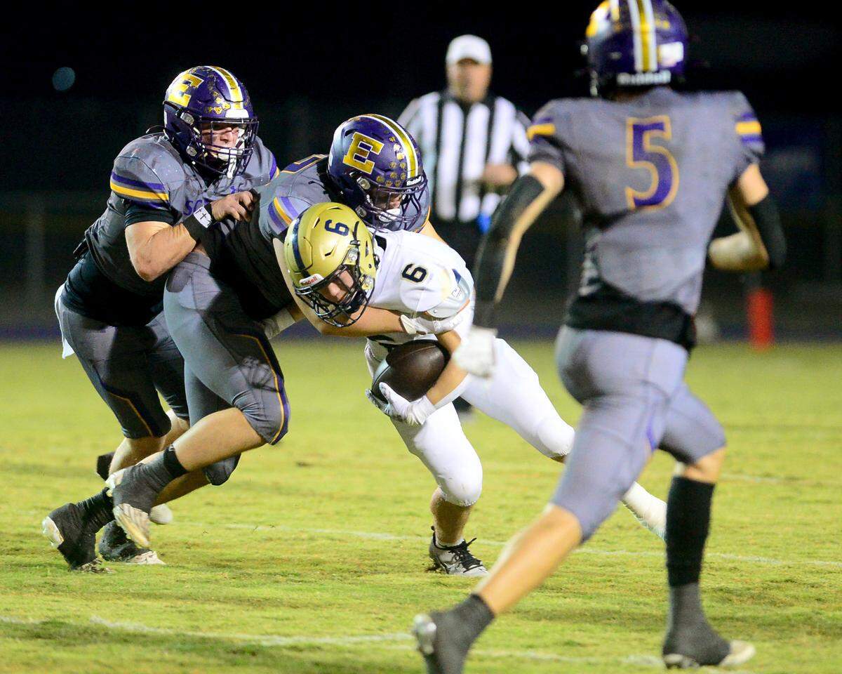 Escalon’s Ryan Murphy (71) takes down West Park running back Westin Wade (6) during a 2023 CIF San Joaquin Section Division IV football game between Escalon and West Park at Escalon High School in Escalon, California, on Nov. 17, 2023. Escalon won the game 48-28.