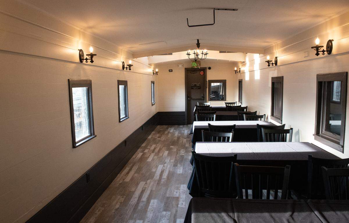 Seating for dining in a converted railcar at Central Station Bar and Grill in Turlock, Calif., Tuesday, Dec. 6, 2022.