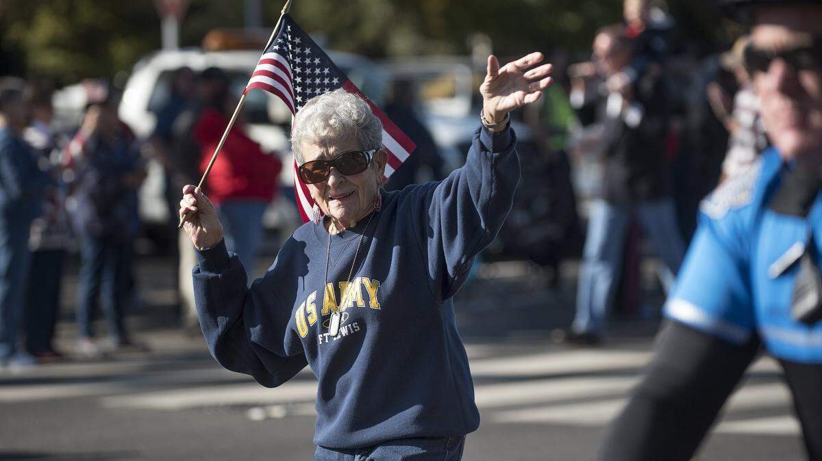 Modesto City Council member Jenny Kenoyer waves to spectators along Needham Street during the 2017 Veterans Day Parade in Modesto. She announced Tuesday that she has been diagnosed with lung cancer.
