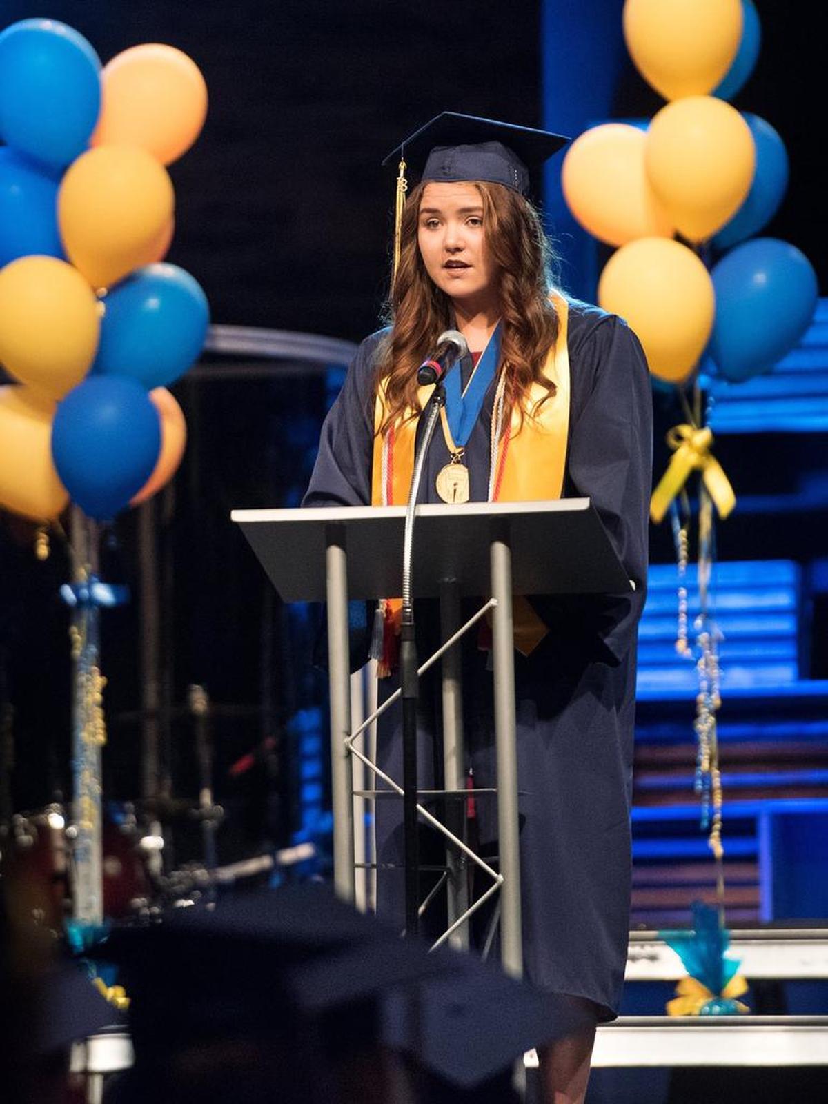 Valedictorian Evelyn Raingruber speaks during the Big Valley Christian School graduation ceremony at Big Valley Grace Community Church in Modesto, Calif., Friday, June 1, 2018. Raingruber will be attending Liberty University.