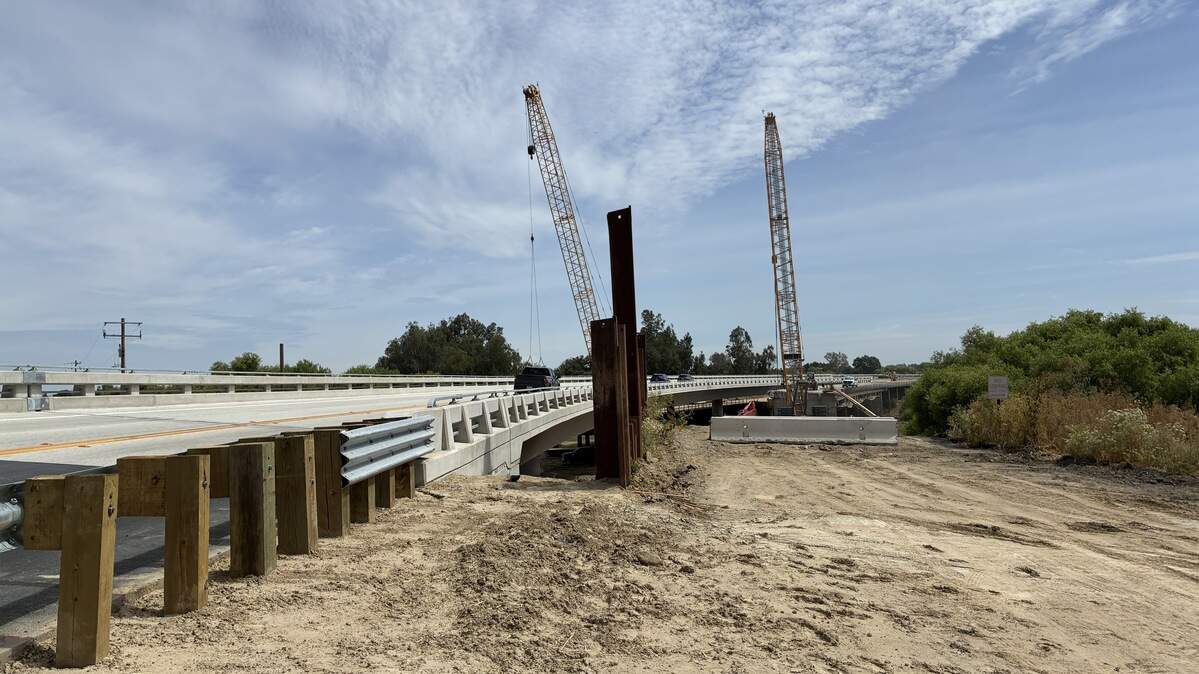 Cranes above a bridge over the San Joaquin River