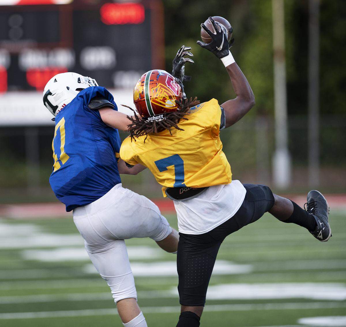 South’s Dhameer Warren, 7, (Merced) intercepts a pass in for front of North’s Valdik Sutherland (Mountain House) during the Central California Lions All-Star Football game at Lincoln High School in Stockton, Calif., Saturday, June 15, 2019.