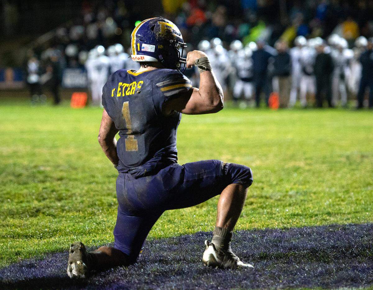 Escalon’s Ryker Peters celebrates a touchdown in the CIF State Division 4-AA Football Championship game with Northwood in Escalon, Calif., Saturday, Dec. 10, 2022.