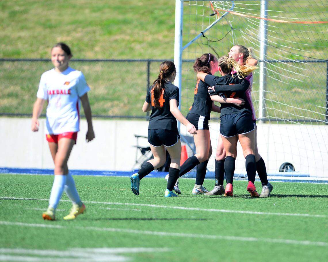 Roseville High School players celebrate after winning the Sac-Joaquin Division III Section Championship game over Oakdale High School at Cosumnes River College in Sacramento, Calif. on Saturday, March 1, 2025.