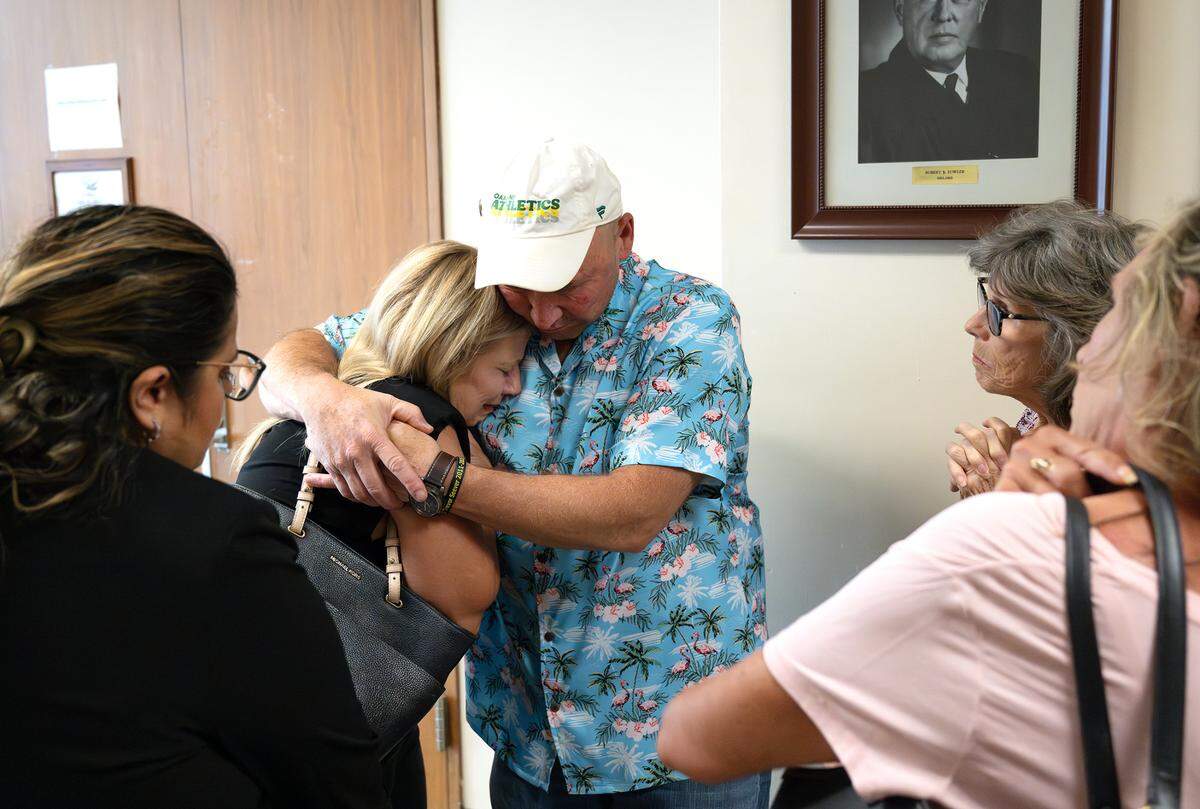 The mother of Trevor Seever, Darlene Ruiz, left, is comforted by her husband Ray after the judge cleared former officer Joseph Lamantia in the fatal shooting of Seever. Photographed at the Stanislaus County courthouse in Modesto, Calif., Friday, July 21, 2023.