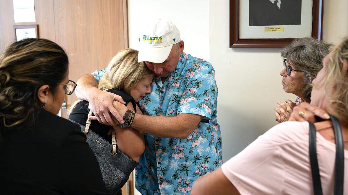 The mother of Trevor Seever, Darlene Ruiz, left, is comforted by her husband, Ray, after the judge cleared former officer Joseph Lamantia in the fatal shooting of Seever. Photographed at the Stanislaus County courthouse in Modesto, Calif., Friday, July 21, 2023.