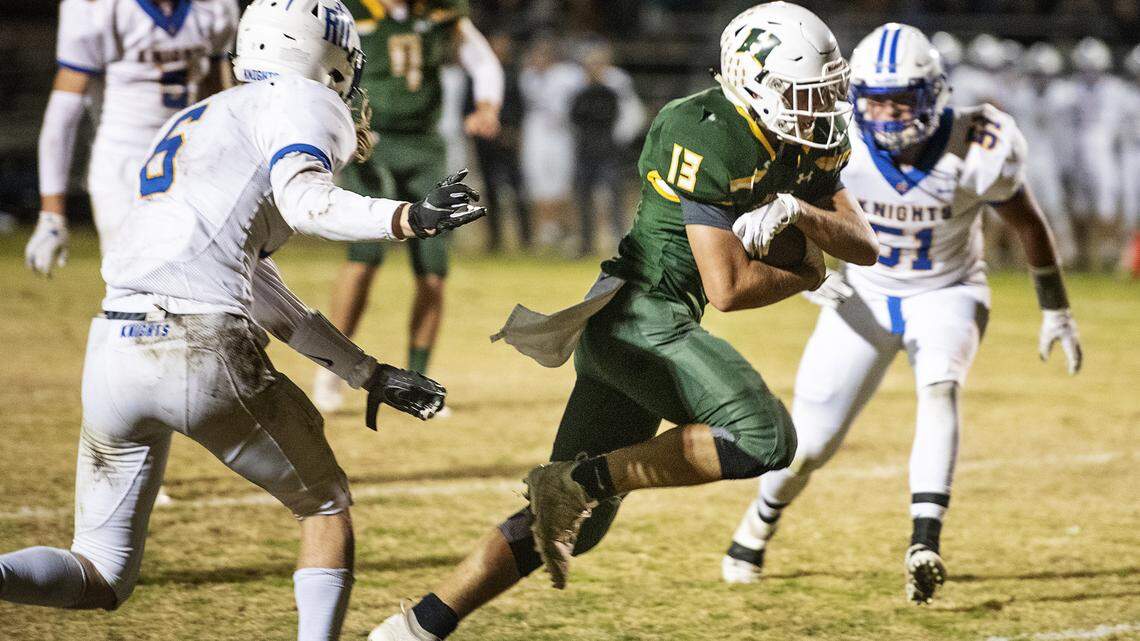 Hilmar’s Cole Bailey scores a touchdown during the Sac-Joaquin Section Division VI semifinal game with Ripon Christian on Friday at HIlmar High School in Hilmar, Calif., Friday, Nov. 22, 2019. Hilmar won the game 47-28.