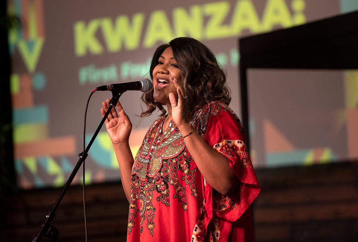 Vocalist Shuntavia performs during the Modesto-Stanislaus NAACP Holiday Kwanzaa Social at Redeemer Modesto in Modesto, Calif., on Friday, Dec. 10, 2021.