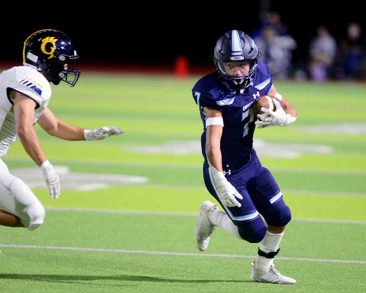Downey running back Elijah Tamayo (7) runs up the sideline during a game between Downey and Gregori at Downey High School in Modesto, California on October 27, 2023.