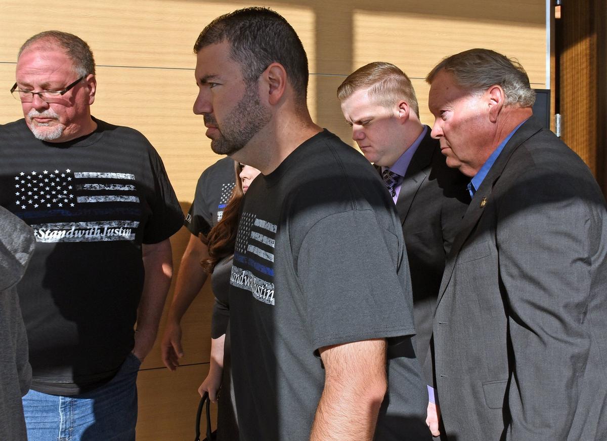 Stanislaus County sheriff’s Deputy Justin Wall, second from right, is pictured with supporters on Monday morning, Sept. 17, 2018, at the conclusion of a court hearing in San Joaquin Superior Court. The deputy is accused of voluntary manslaughter in the shooting death of Evin Olsen Yadegar of Modesto during a pursuit in Ripon, Calif.