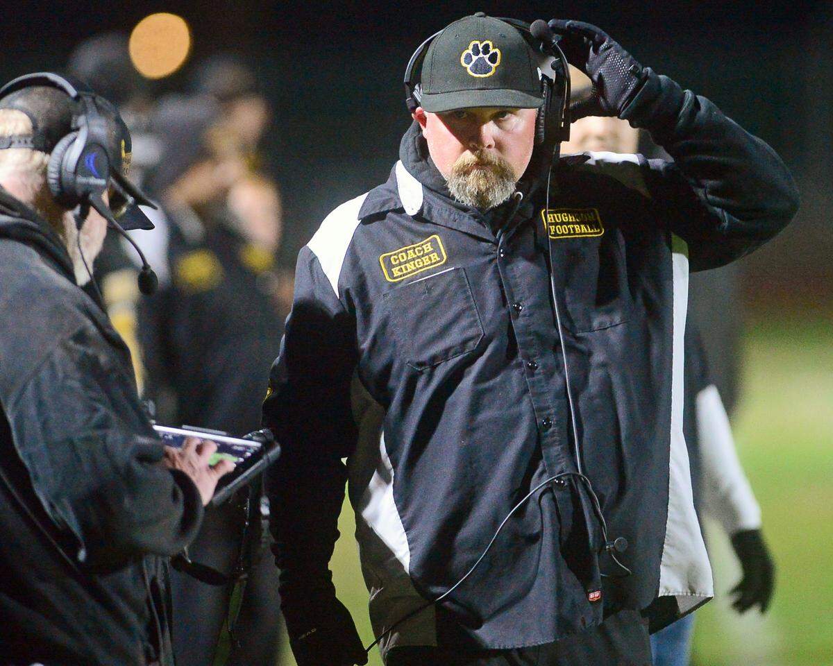 Hughson coach Shaun King walks the sideline during a Sac-Joaquin Section Division VI playoff game against Orestimba in Hughson, California, on Nov. 18, 2022. Hughson won 21-17.