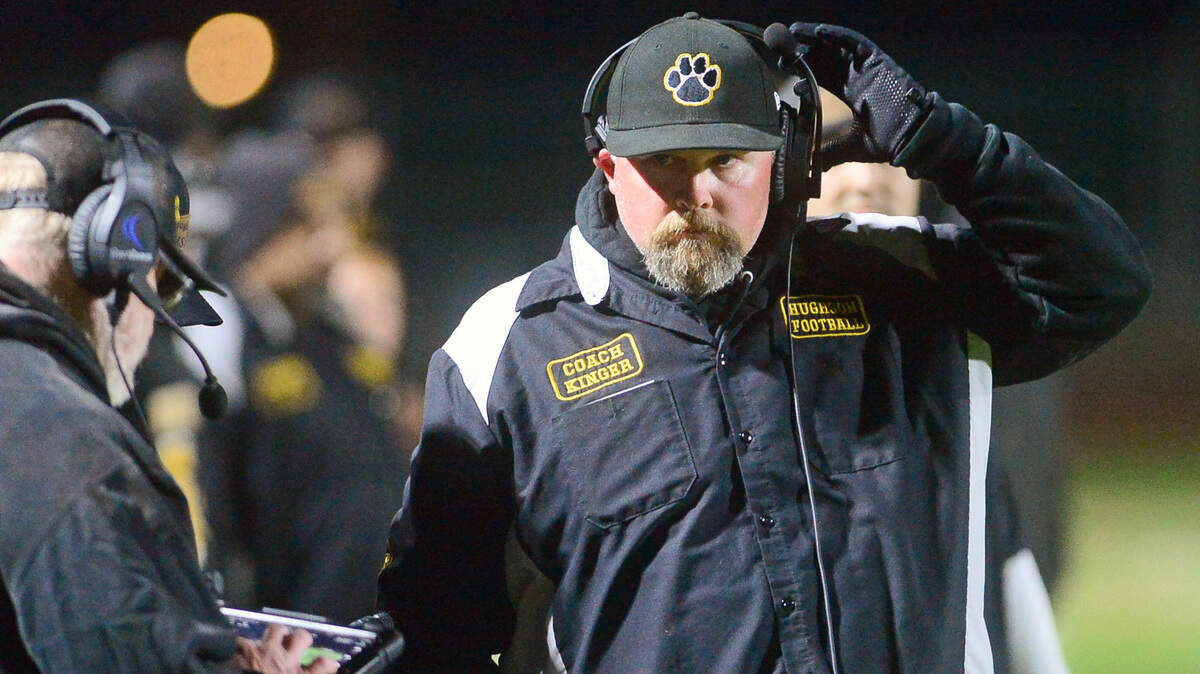 Hughson head coach Shaun King walks the sideline during a Sac-Joaquin Section Division VI football playoff game between Hughson High School and Orestimba in Hughson on Nov. 18, 2022. Hughson won the game 21-17.