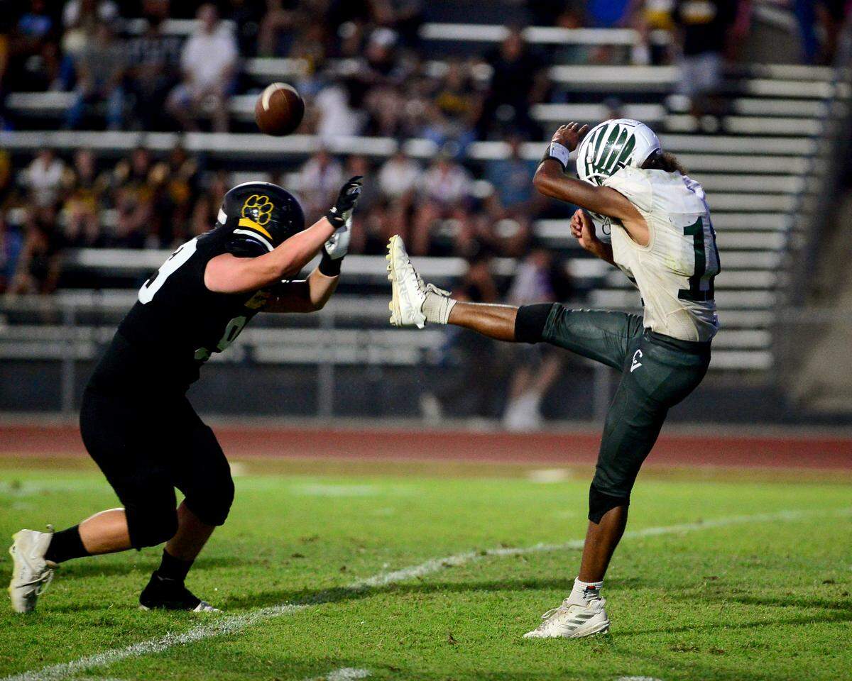 Hughsons Ryan Borrelli blocks a punt during a game between Hughson High School and Central Valley High School at Hughson High School in Hughson California on August 25, 2023.