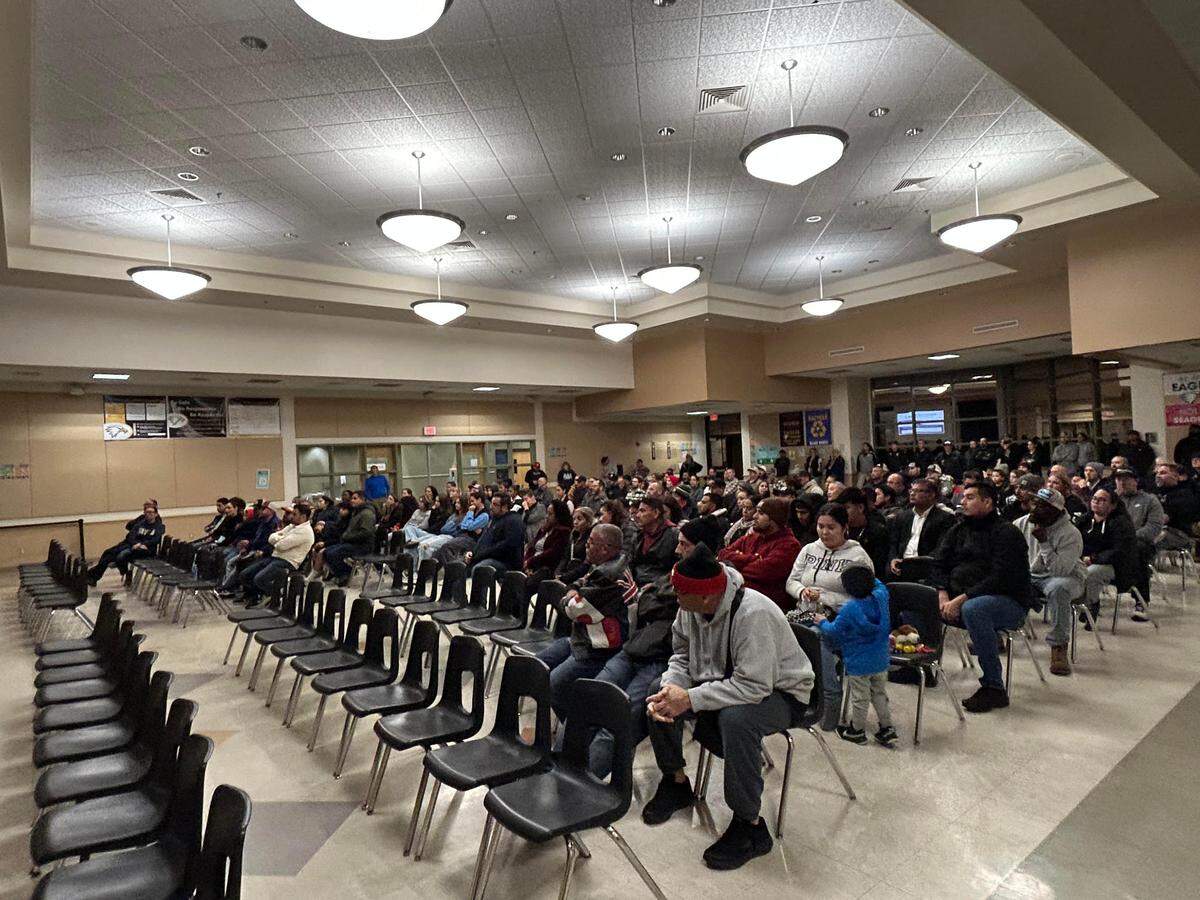 Members of the Modesto Youth Soccer Association listen to Ryan Daley and Mitch Watson at Enochs High School on Dec. 19, 2024. Watson was fired amid accusations of mismanaging the organization’s funds.