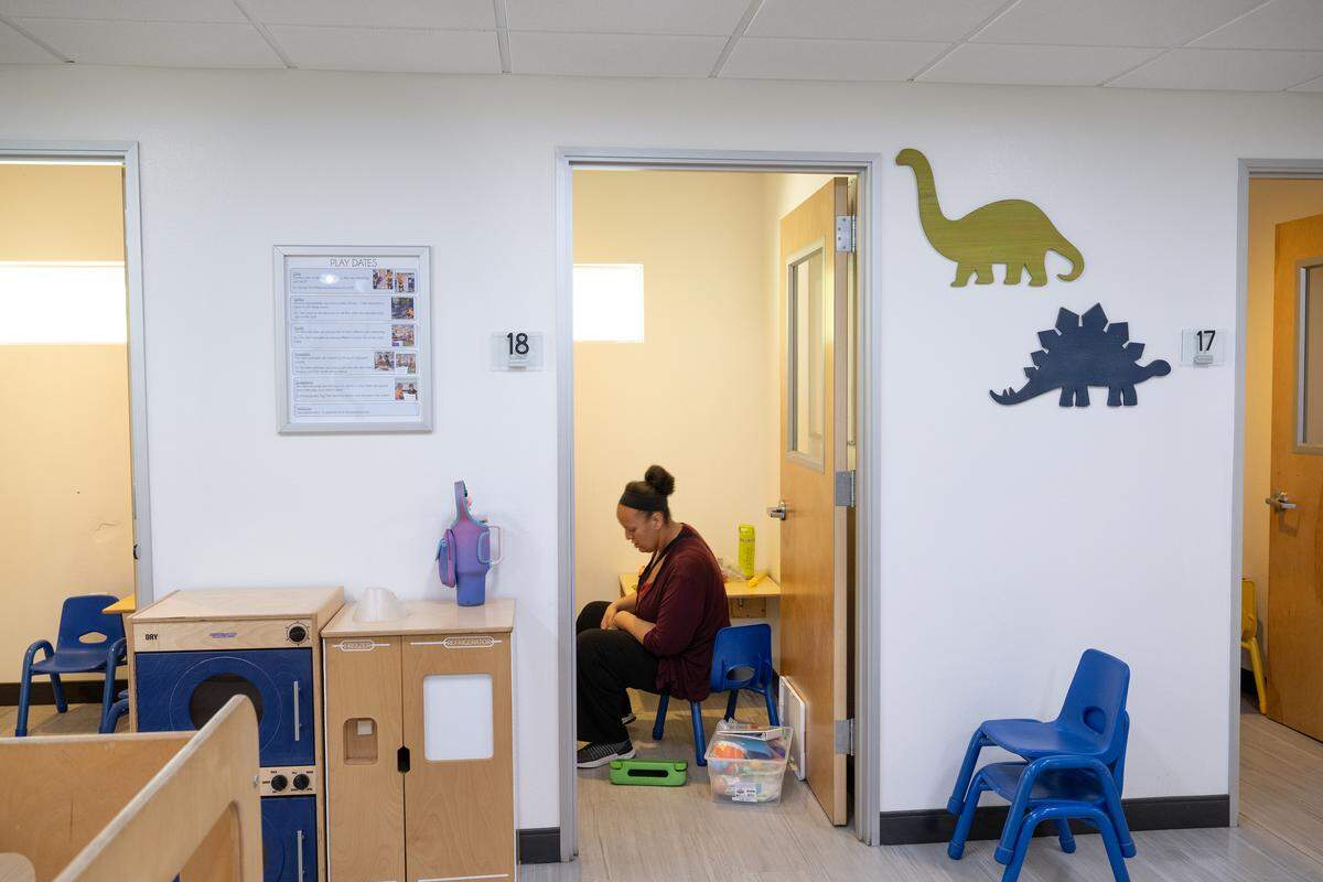 Behavioral technician Micaela Parker works with a child in a private room at the Behavioral and Educational Strategies and Training center in Modesto, Monday, Aug. 25, 2025.  