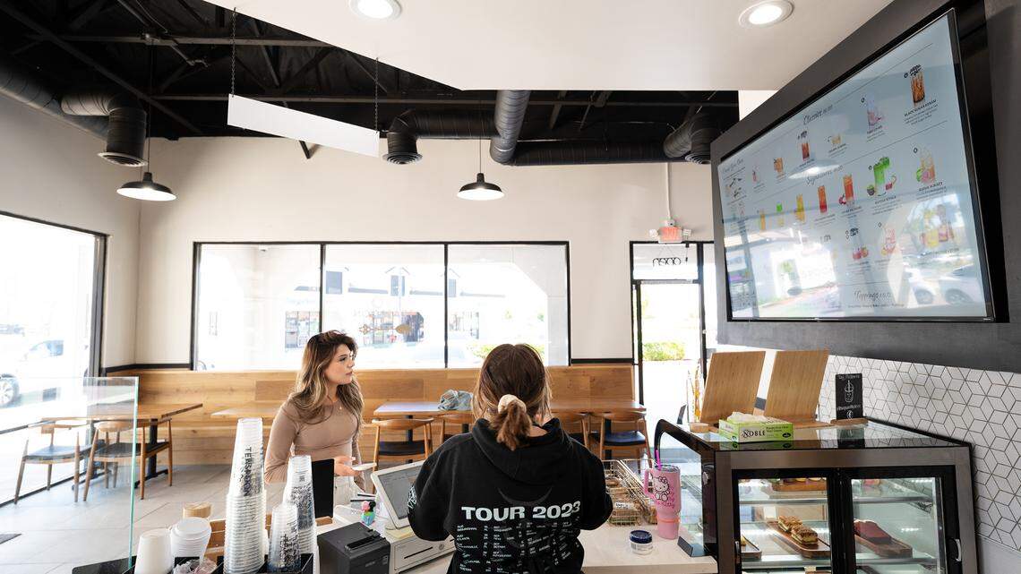 Wendy Montes orders a drink from barista Emma Goodwin at Teaspoon cafe in Modesto in April 2024. A new Teaspoon location is opening at 2441 Fair Oaks Blvd. in Arden Arcade on Saturday, Aug. 17, 2024.