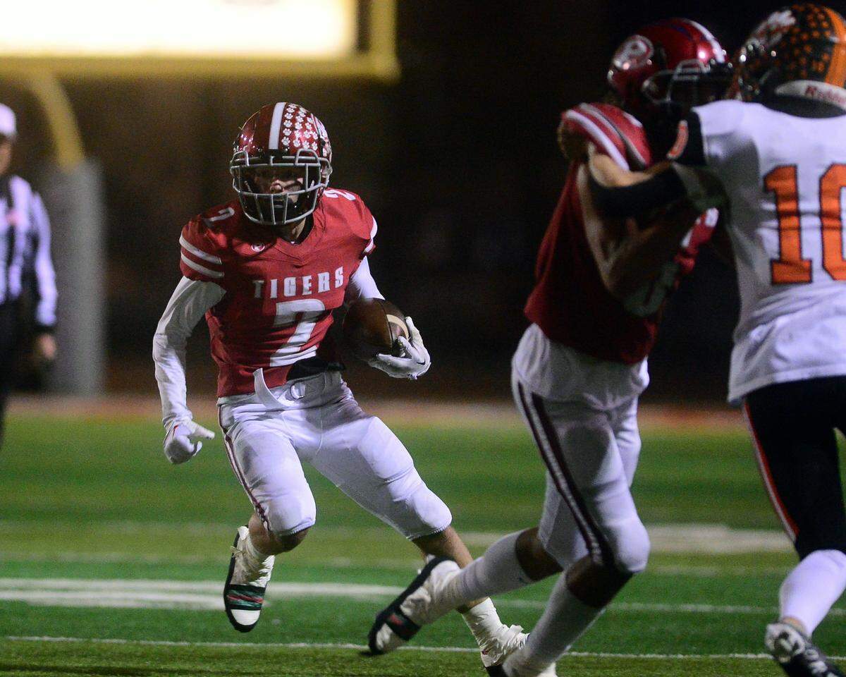 Patterson receiver Noah Cozart cuts back during a CIF Division III Sac-Joaquin Section football playoff game against Roseville at Patterson High School in Patterson, California, on Nov. 11, 2022. Patterson won 56-34.