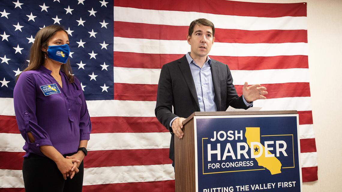 Congressman Josh Harder, and his wife, Pam, talk to the media in downtown Modesto, California, on Tuesday, Nov. 3, 2020.