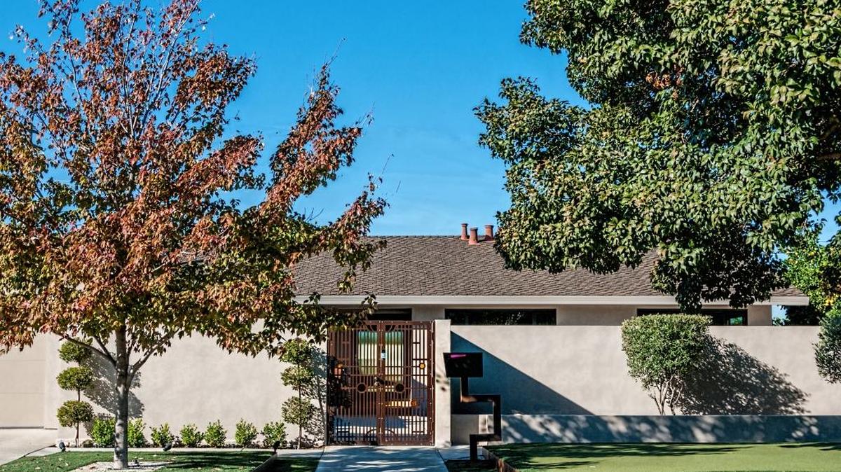 This Strathmore Drive home won Garden of the Month honors from the garden club.