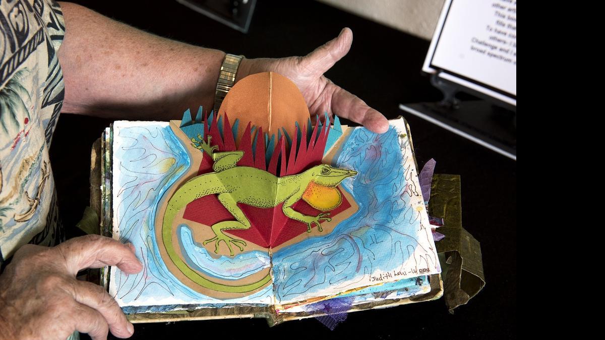 
A book by artist Chloe Fonda with art by Judith Levi-Wood from the “12 Artists 12 Books” show at Peer Recovery Art Project, on J Street in Modesto on June, 3, 2015. All books in the show were made in collaboration with 12 artists.
