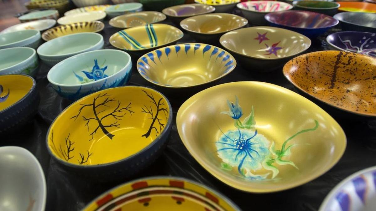 Painted bowls are on display for the Empty Bowls event at the Peer Recovery Art Project in Modesto on Feb. 12, 2016.
