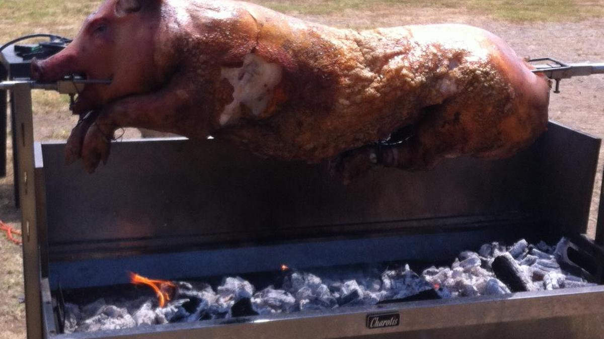 A pig is roasted at a past year’s Four Fires Festival in Amador County.