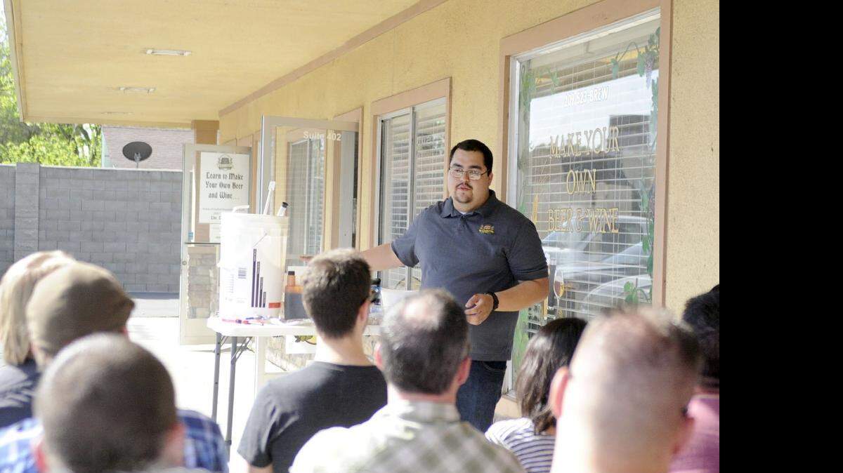 
Jonathan Vigil leads a home brewing class at Barley and Wine in Modesto on March 21.
