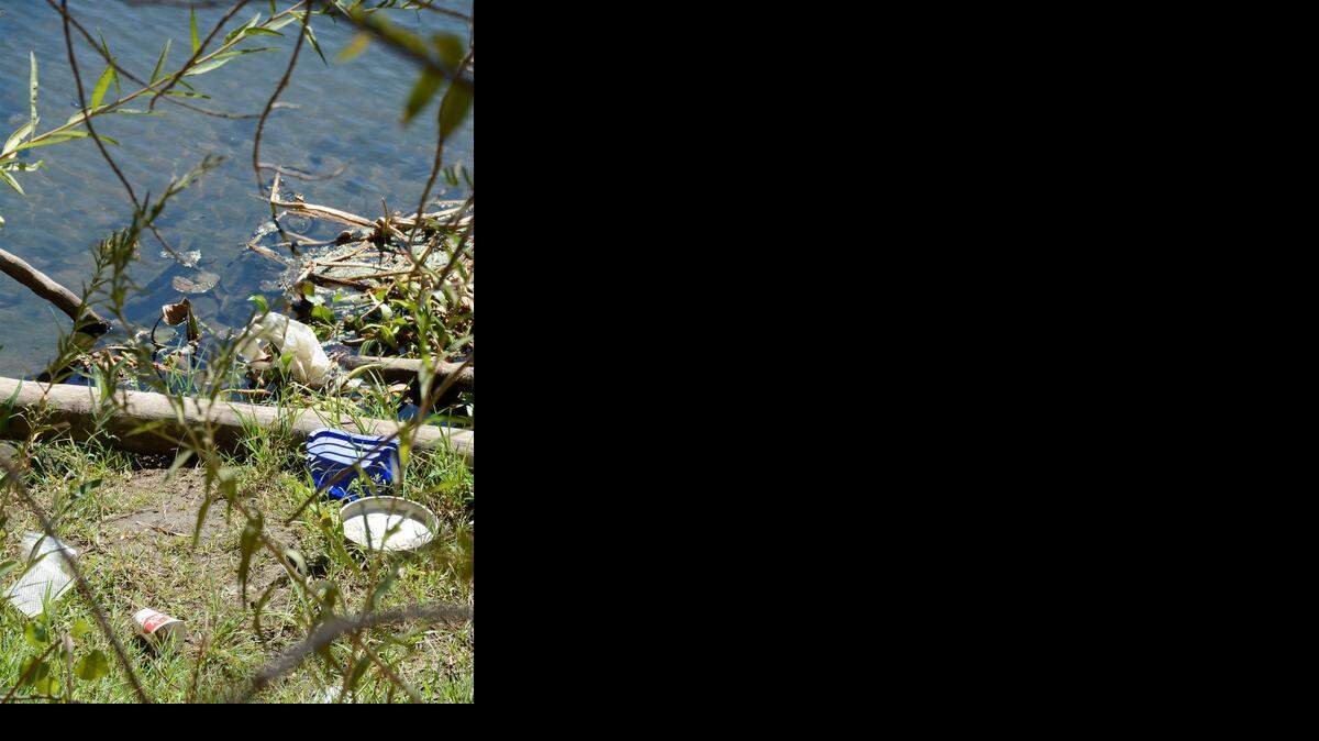 
Trash is pictured on the bank of the Tuolumne River. Volunteers are needed to help with cleanup efforts.

