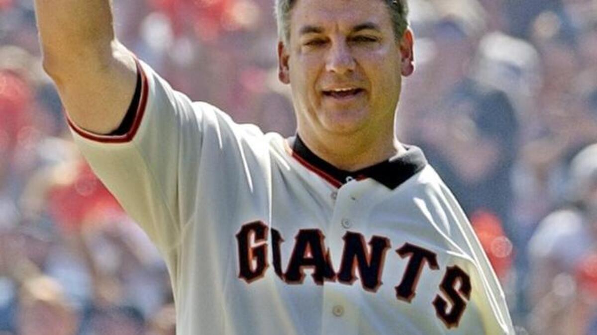 Former San Francisco Giant Dave Dravecky prepares to throw out the first pitch against the St. Louis Cardinals during game three of the NLCS in San Francisco, Saturday, Oct. 12, 2002.