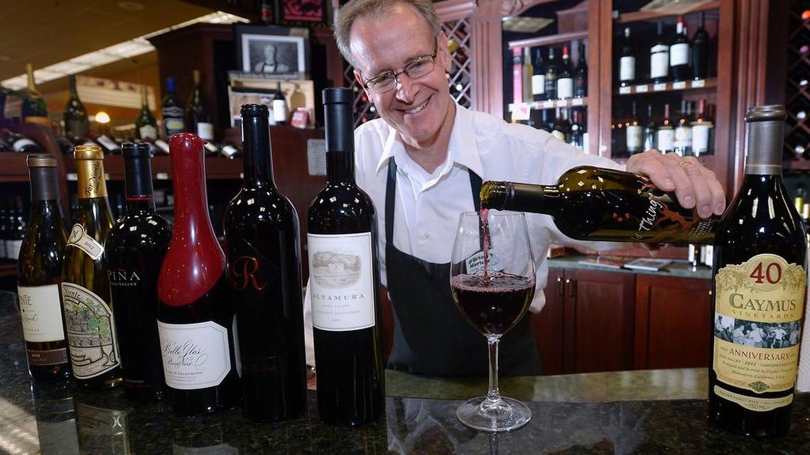
Tom Bender, wine steward at O’Brien’s Market on Dale Road, pours a glass of wine at the store’s tasting bar. He offers 10 tips for enjoyable wine tasting and food pairing.
