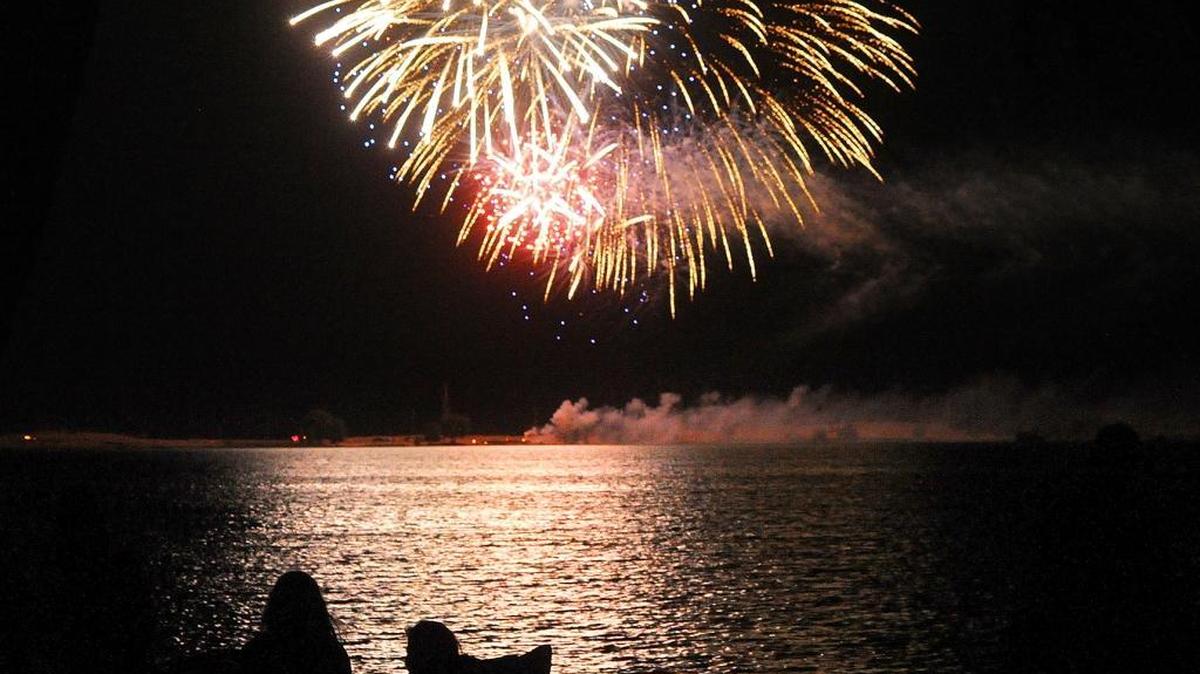 Families and friends gathered on the shores of Woodward Reservoir just outside of Oakdale during a past year’s Fourth of July fireworks show.