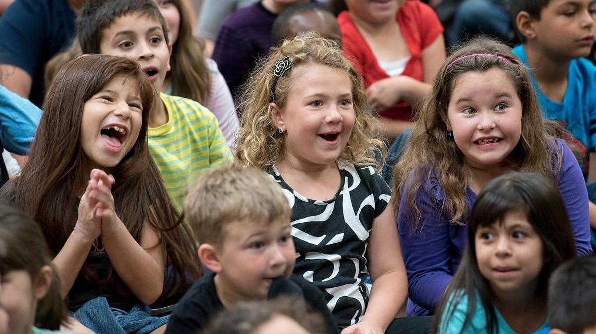 
First-grade students react as violinist Aaron Meyer plays rock music during Modesto Community Concert Association’s music outreach program at Sanders Elementary in March.
