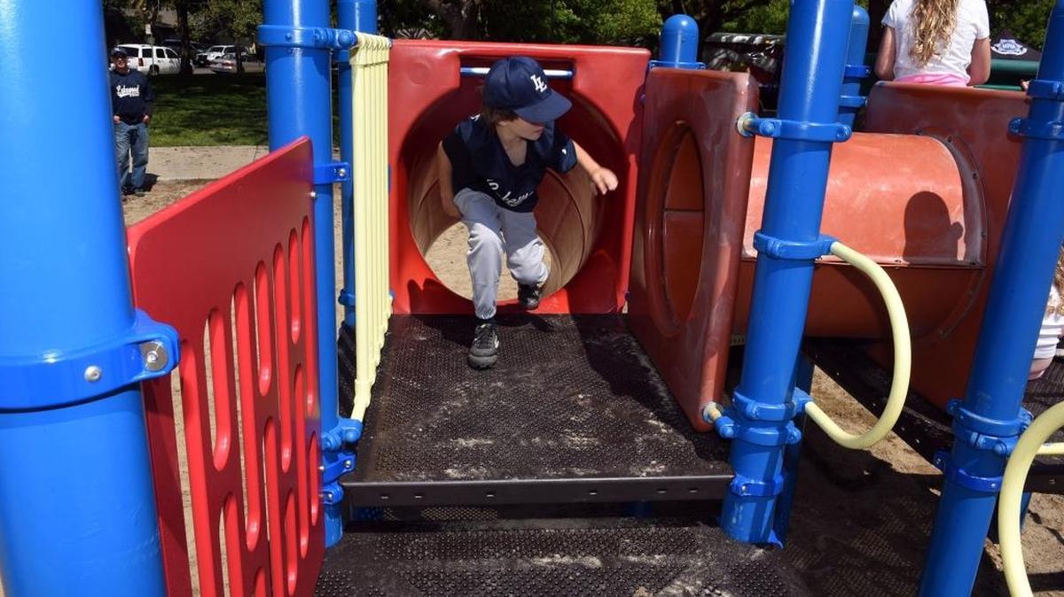Most city parks have two play structures for different age groups of children.