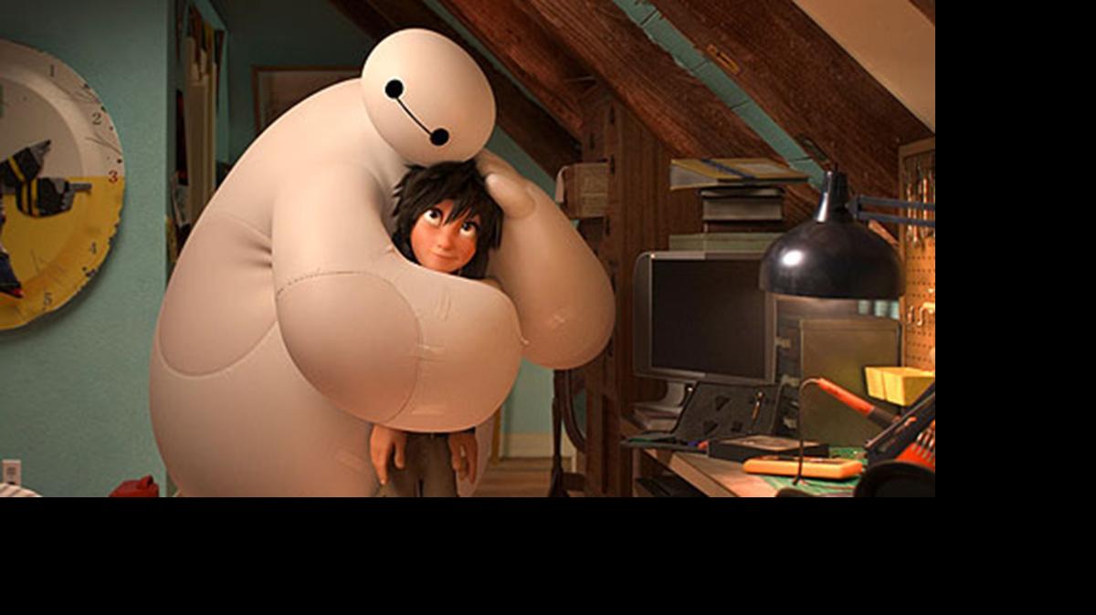 
Young scientist Hiro Hamada (voiced by Ryan Potter) and health care robot Baymax (Scott Adsit) hug in a scene from Disney’s film, “Big Hero 6,” playing Tuesday, June 16, at the Salida Library.
