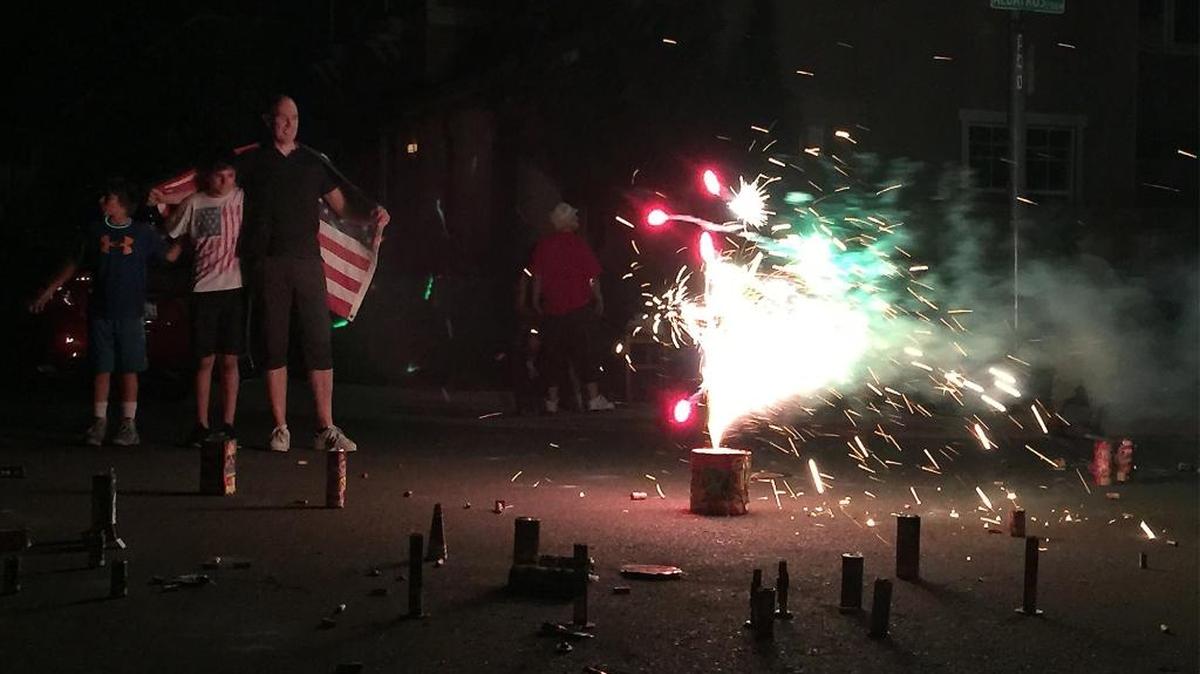People watch home fireworks on the 4th of July 2015 in Modesto.