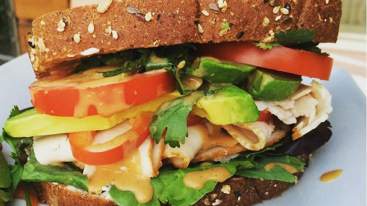 
Chris Lewis of Turlock won a turkey sandwich contest sponsored by Foster Farms, which processes the meat in Turlock and has just launched its first premium lunchmeat. The sandwich is made on whole-wheat bread and includes turkey, avocado, tomatoes, red bell peppers, sriracha mayonnaise, cilantro, lettuce and a homemade Thai peanut sauce.

